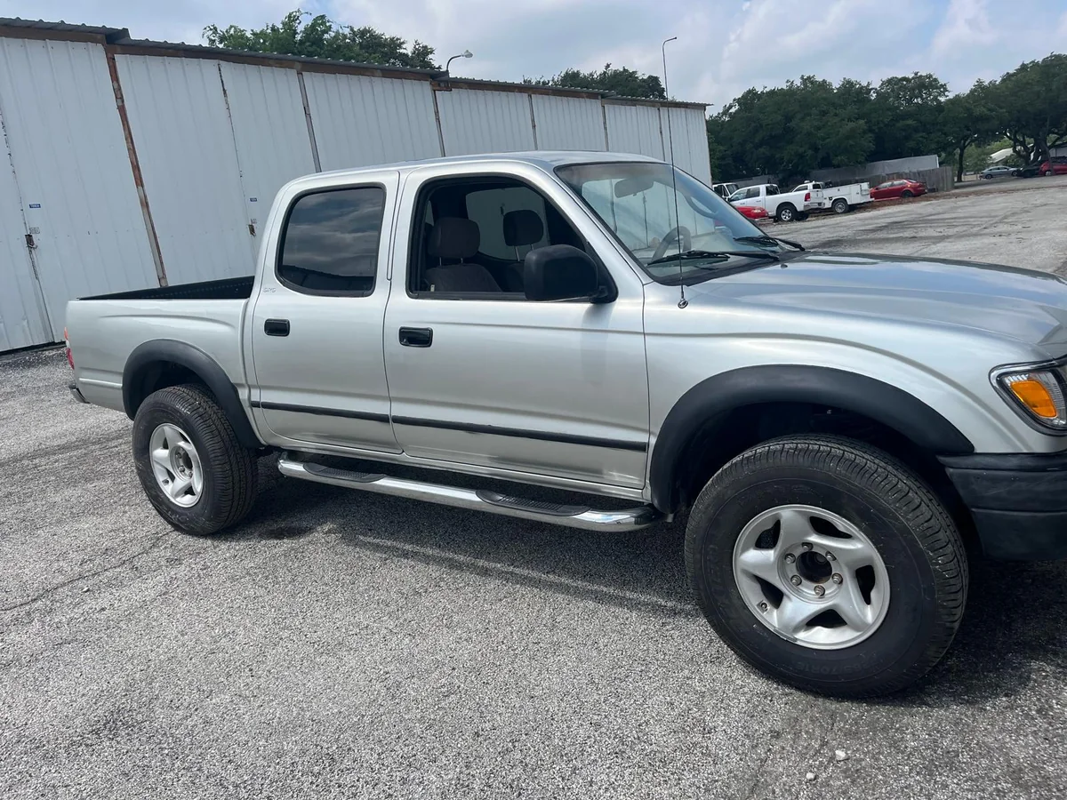 Silver Tacoma crew cab finished, side view